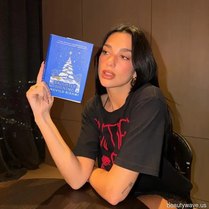 Dua Lipa's starry-night nails have just topped my list of the perfect manicures for New Year's Eve parties.