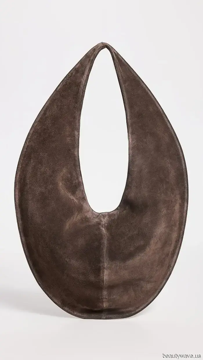 All of my most fashionable friends are already sporting this fall bag trend.