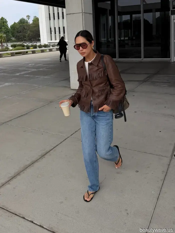 In NYC, every fashionable woman is currently pairing this flat-shoe trend with jeans.