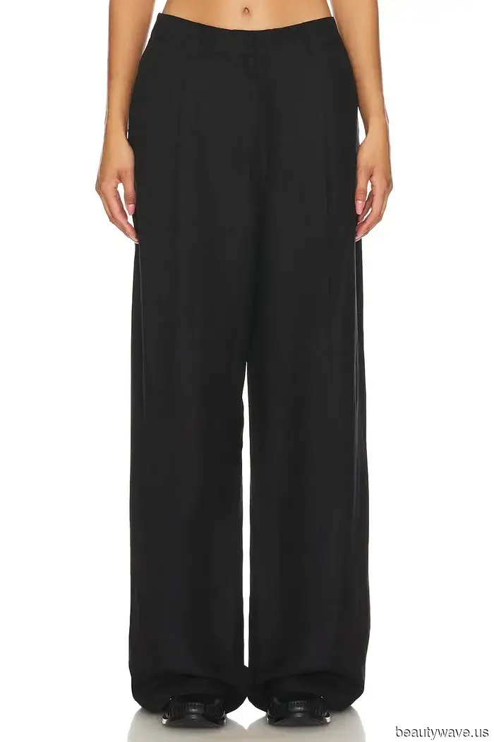 Emma Stone Discovered the Most Stylish Way to Sport a Brown Coat, Right down to Her Red Nails.