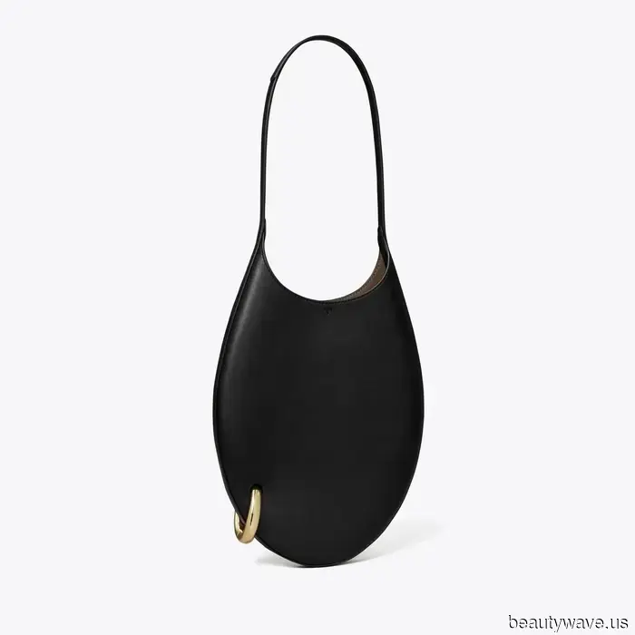 Tory Burch hat gerade eine Taschenversion ihrer viralen durchstochenen Mules veröffentlicht, und wir sind besessen davon.