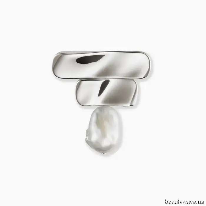 Improvvisamente, le persone alla moda indossano questo accessorio "datato" su maglioni, vestiti e giacche.