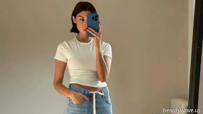 Questa tendenza del denim estivo è l'opposto dei jeans skinny, e lo vedo ovunque