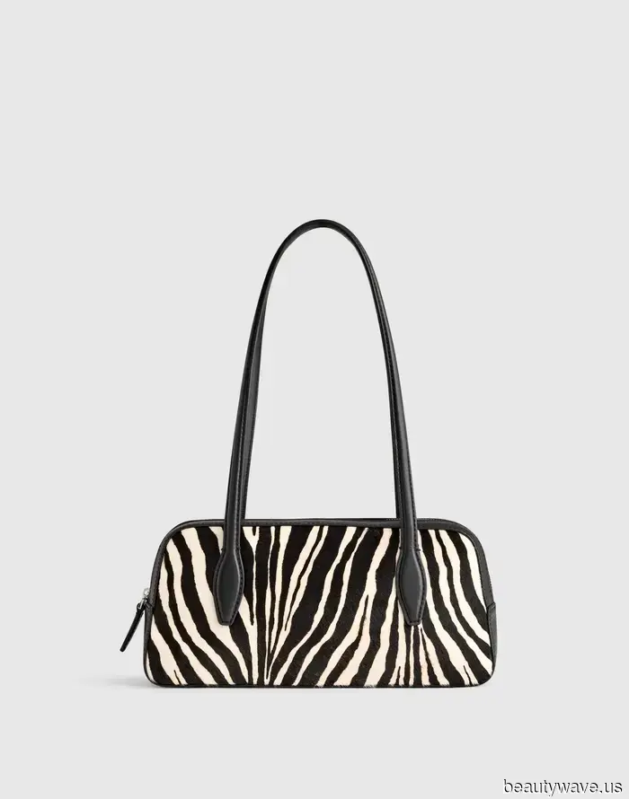 Wenn Sie genug von Leopardenmuster haben, hat Dua Lipa gerade den Taschen-Trend getragen, den Sie stattdessen kaufen sollten.