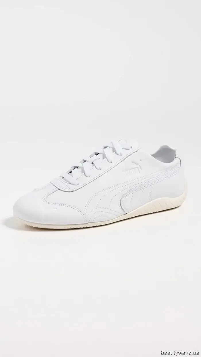 Fashion enthusiasts continue to sport white sneakers—albeit with this pant trend rather than jeans.