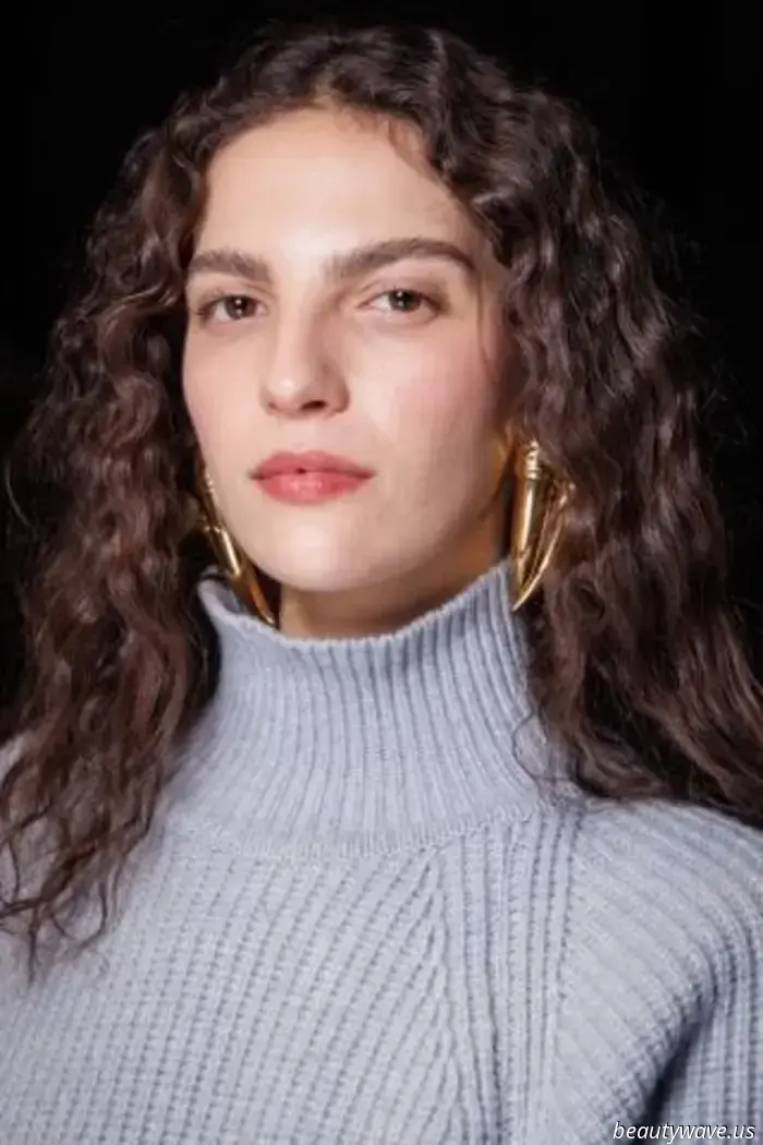 The Balmain woman is swapping her sparkly dresses for comfortable knits.