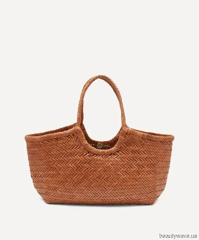 If you’re purchasing a woven bag this summer, opt for this sophisticated, classic design.