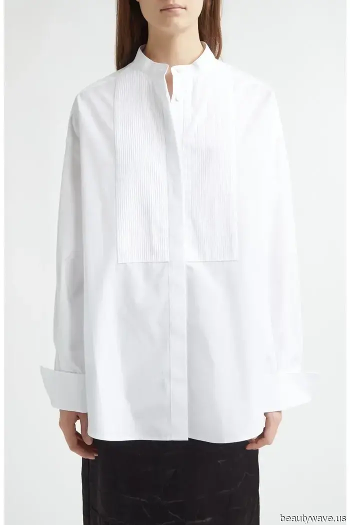 Forget the basic button-downs—*this* is the shirt trend to pair with black trousers this fall.