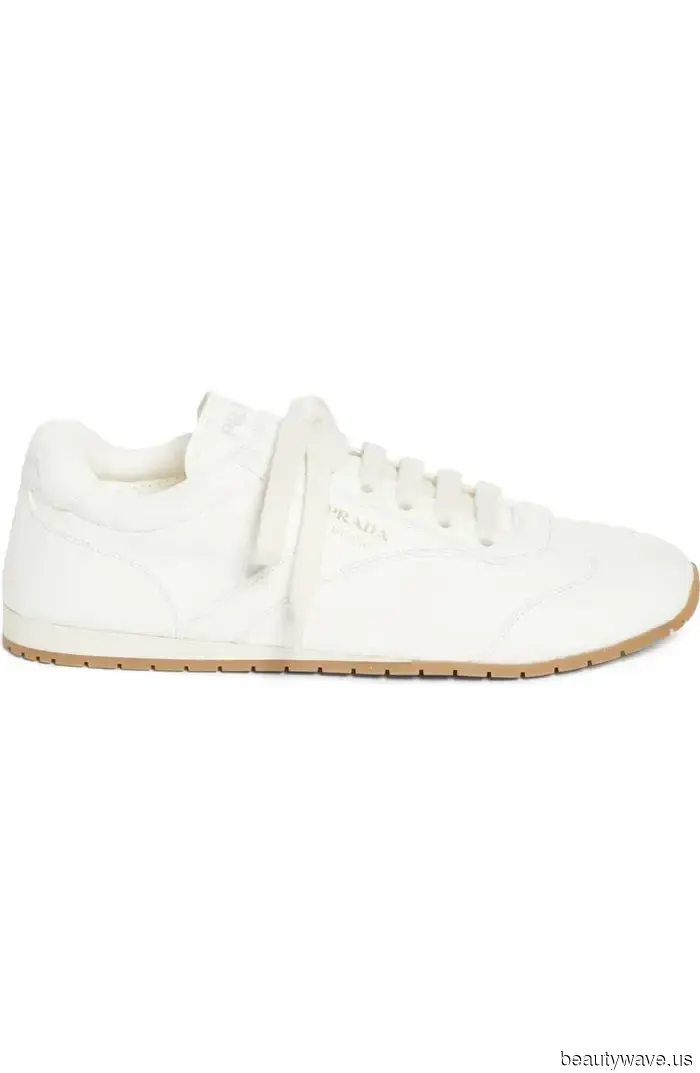 Fashion enthusiasts continue to sport white sneakers—albeit with this pant trend rather than jeans.