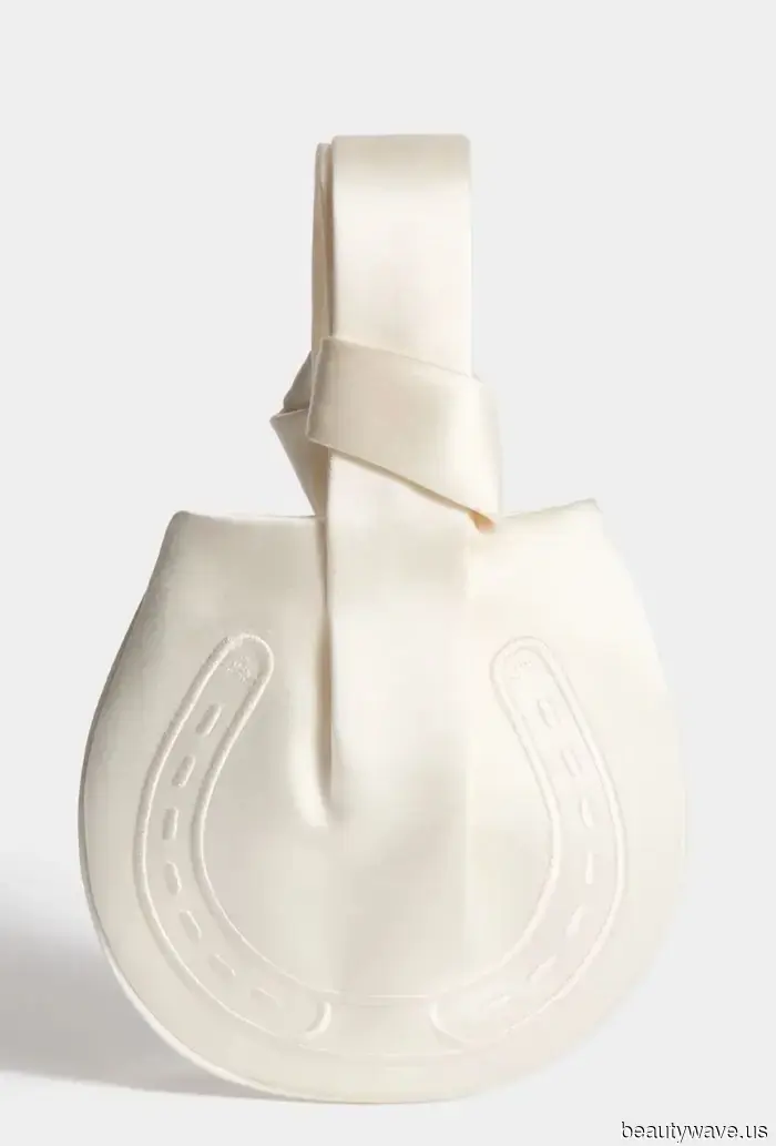 This stunning bride donned a Vera Wang gown and Manolo Blahnik shoes for her sophisticated, timeless countryside wedding.