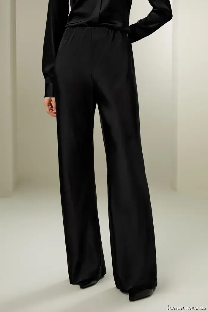 Como por arte de magia, este estilo de pantalón brillante hace que los conjuntos completamente negros luzcan tan elegantes