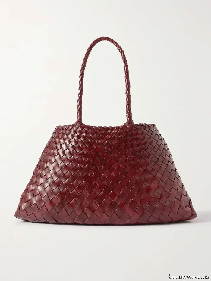 If you’re purchasing a woven bag this summer, opt for this sophisticated, classic design.