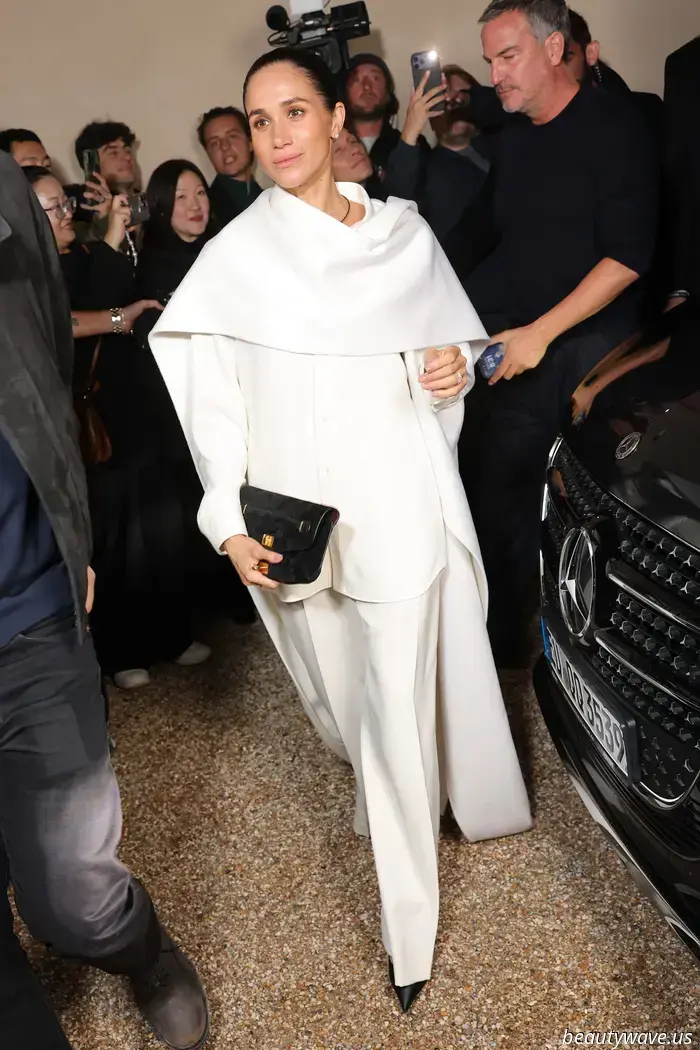 Meghan Markle made her debut at Paris Fashion Week, donning two custom designs from Balenciaga.