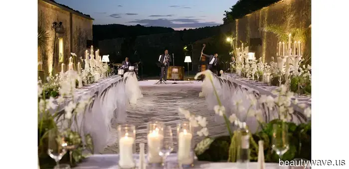 This stylish couple got married at a 19th-century Sicilian masseria in custom outfits created by the bride.