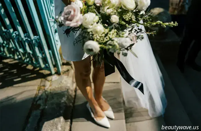 This lovely bride donned a stylish Reformation minidress for her intimate wedding in Wales, which had 26 guests.