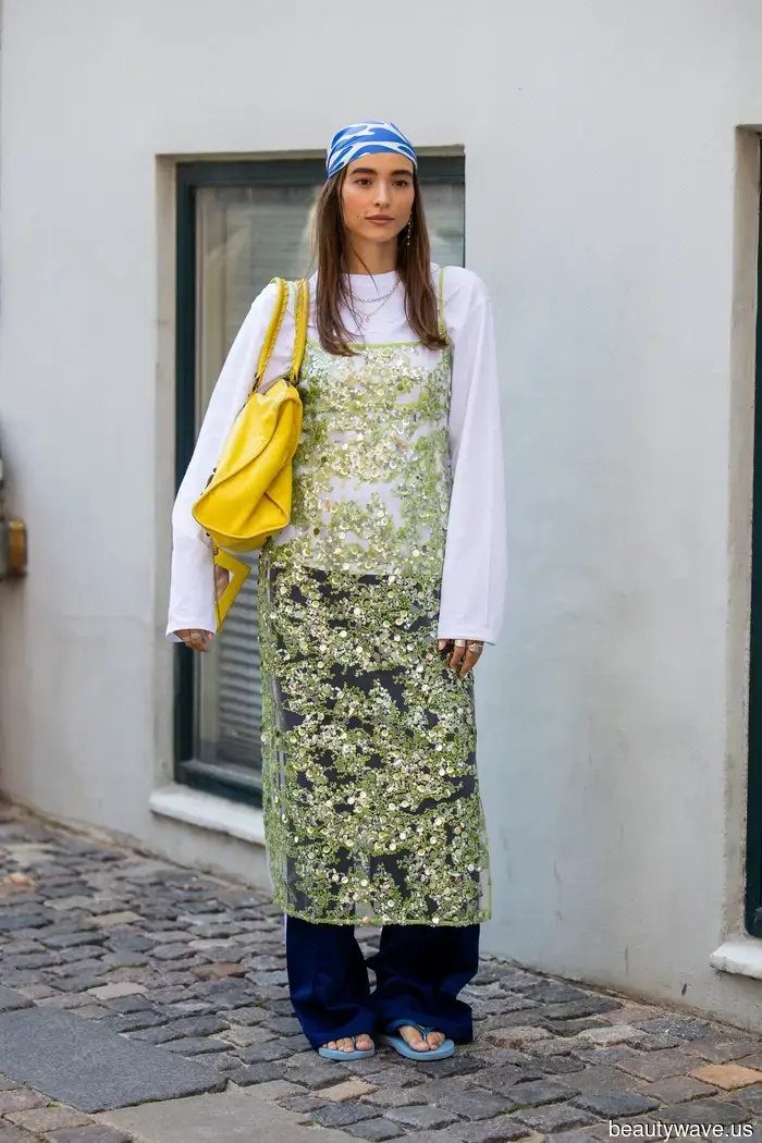 Scandi girls in Copenhagen showcased this debated layering trend with jeans during Fashion Week.