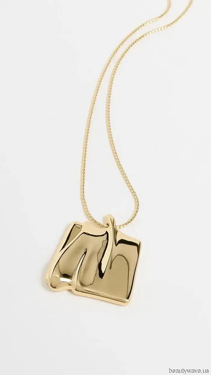 The Unexpected Jewelry Trend That People Are Pairing With Coats and Sweaters This Season