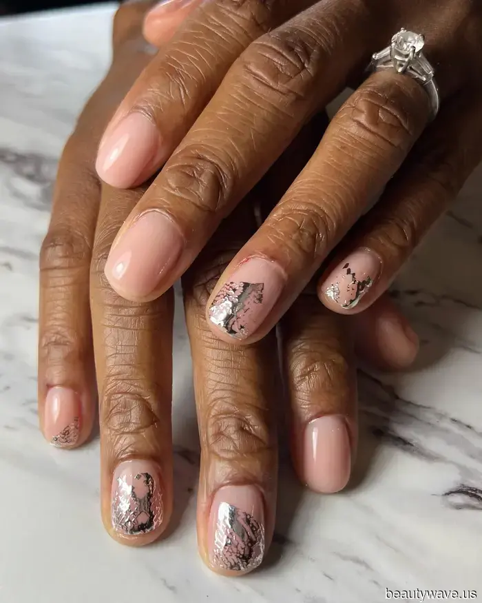 The most prominent fall manicure trends this year feature coquette elements and vibrant, rich hues.