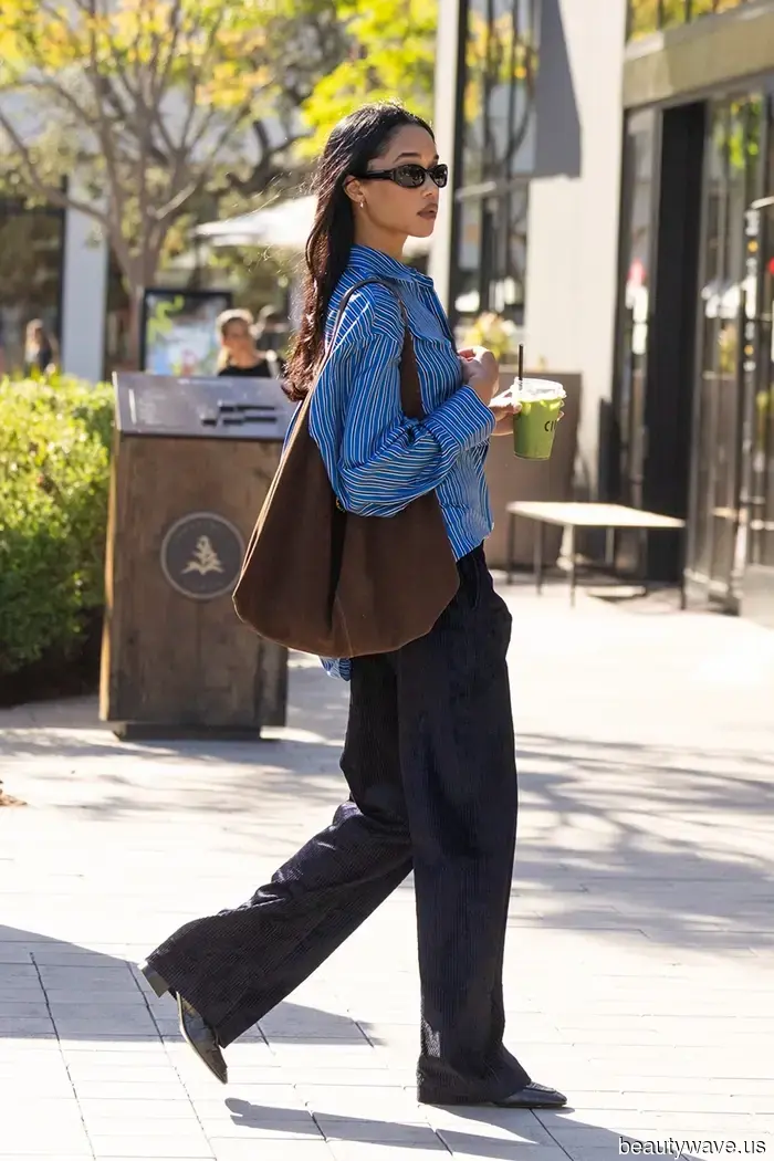 Le It Girls di L.A. e NYC indossano questa tendenza di camicie "noiose" con jeans e pantaloni.