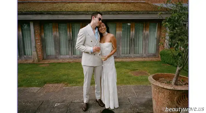 This stunning Babington House wedding featured a Brazilian welcome BBQ, a custom gown, and an adorable puppy.