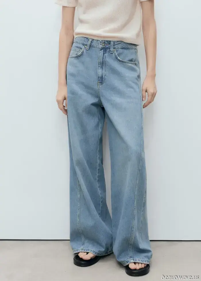 Dakota Johnson Recently Wore the Timeless Top That Effortlessly Elevates Baggy Jeans