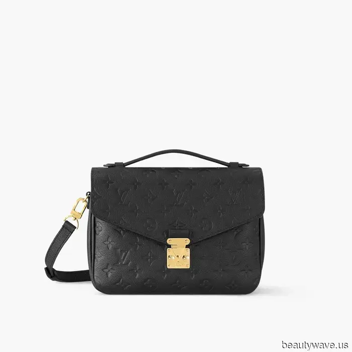 Emma Stone Discovered the Most Stylish Way to Sport a Brown Coat, Right down to Her Red Nails.