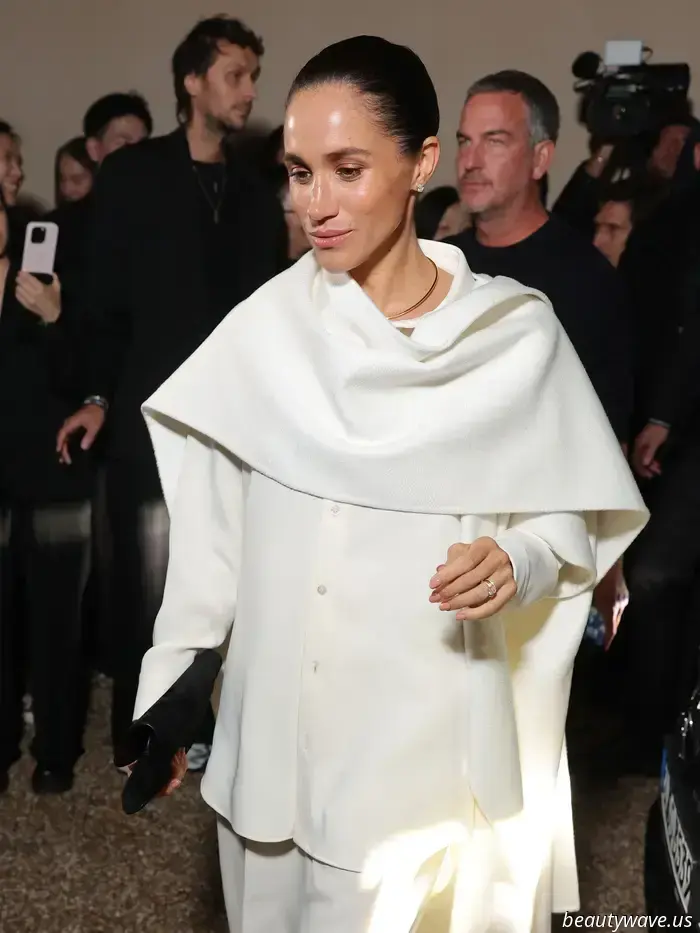 Meghan Markle made her debut at Paris Fashion Week, donning two custom designs from Balenciaga.