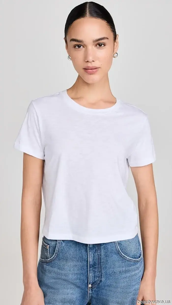 Emma Stone Discovered the Most Stylish Way to Sport a Brown Coat, Right down to Her Red Nails.