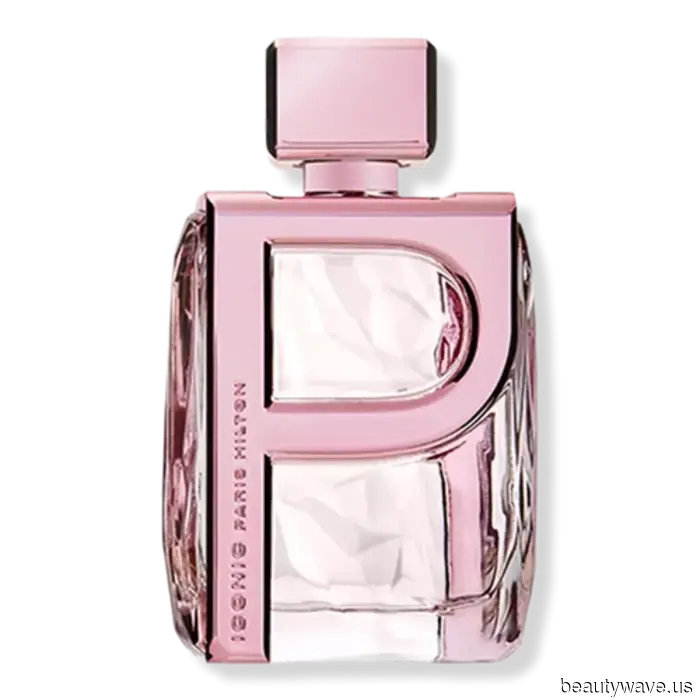 Paris Hilton's Universe: Her Pink Motorola Razr, Preferred Y2K Styles, and the Significance of 11:11 Media to Her