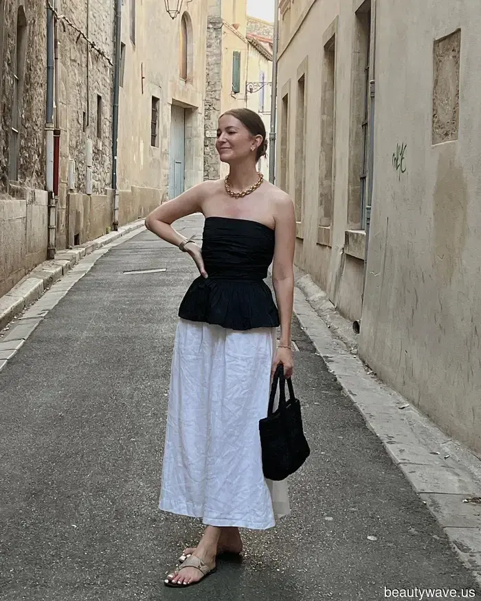 Invece dei jeans, le persone a Parigi indossano questo elegante capo con ballerine e mocassini.