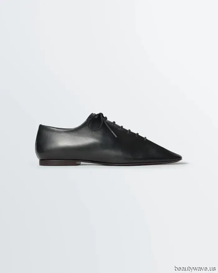 Forget the trainers—this stylish flat shoe enhances any airport attire.