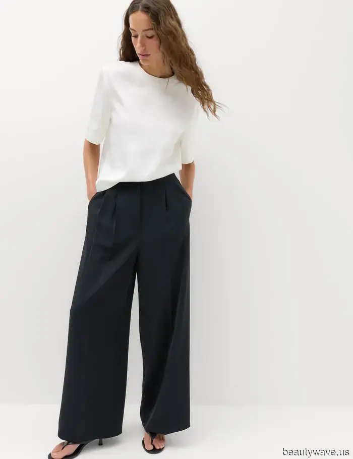 Elegante über 50-Jährige tauschen Kleider und Sandalen gegen diese Hose-und-Schuh-Kombination vor dem Herbst.