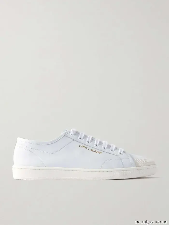 Fashion enthusiasts continue to sport white sneakers—albeit with this pant trend rather than jeans.