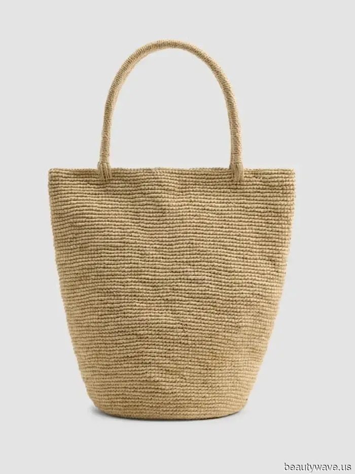 Fact: This French Girl Bag trend instantly makes black trousers and loafers look ready for summer.