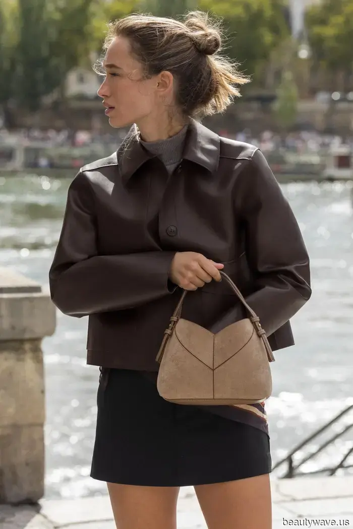 If you're holding this sophisticated handbag style, it shows you have a classic sense of fashion.