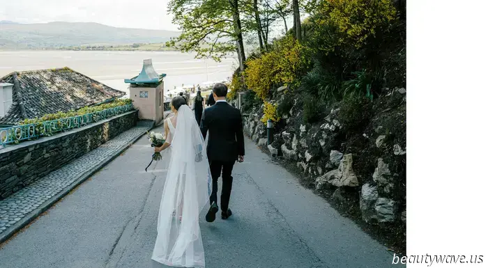 This lovely bride donned a stylish Reformation minidress for her intimate wedding in Wales, which had 26 guests.