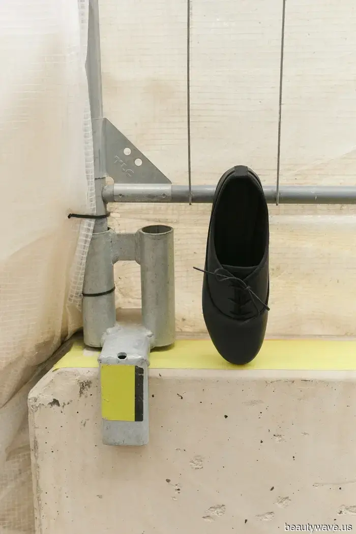 Forget the trainers—this stylish flat shoe enhances any airport attire.