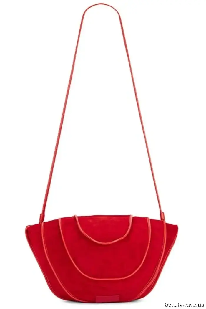 Las mujeres más elegantes de Londres saben que este color de bolso que no es negro hace que los abrigos trench se vean más elegantes.