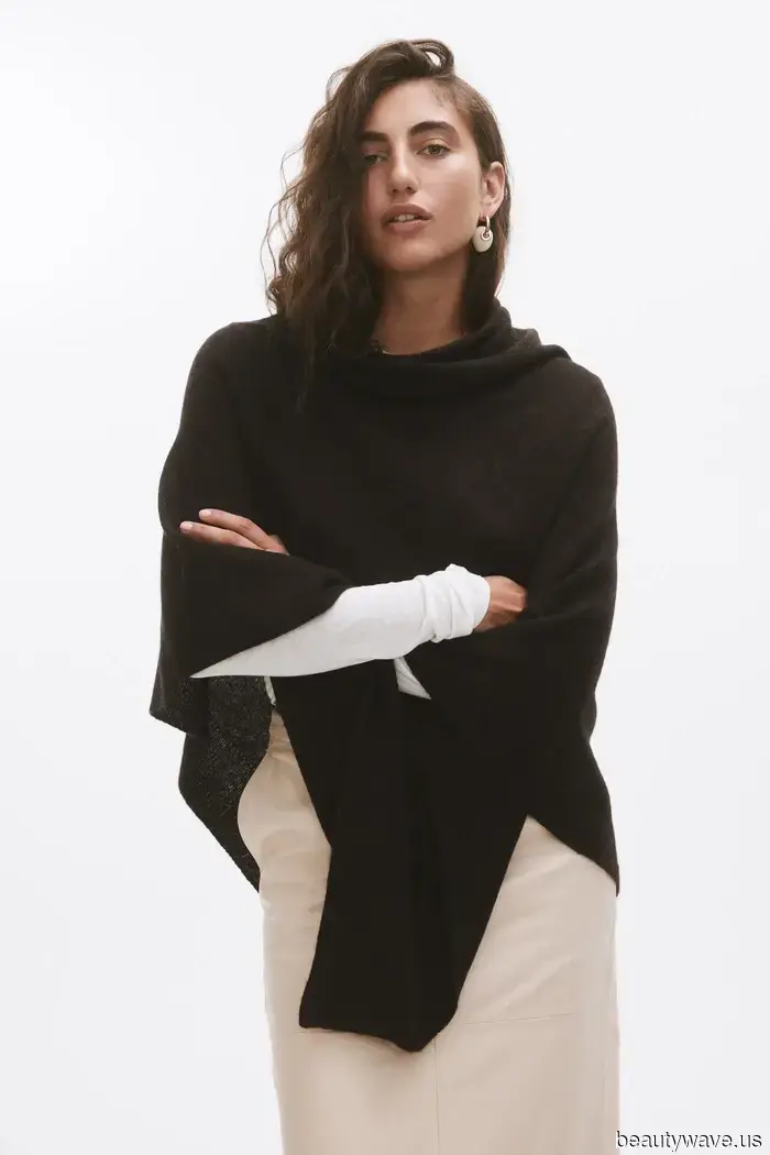 If you want your airport looks to exude first-class style, swap your jacket for this chic essential instead.