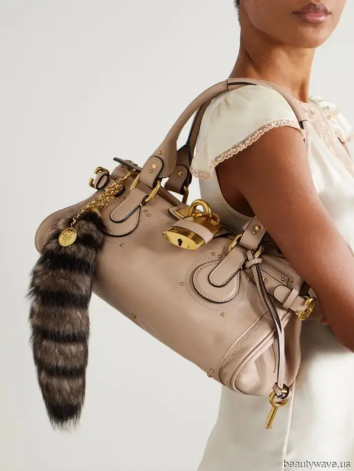 Not Pillbox Hats or Capes—this winter's accessory trend for those with style will be the "Rich" look.