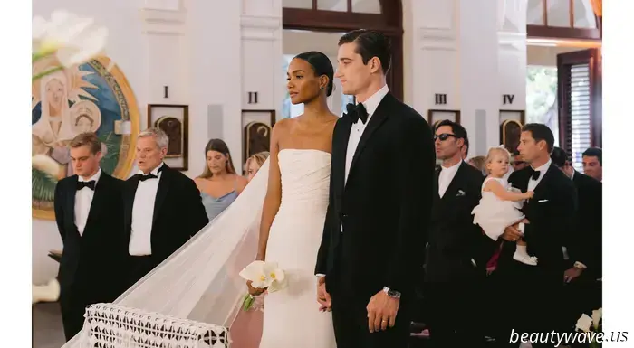 The bride donned a custom-made dress, while the groom opted for Ralph Lauren for their stunning beach wedding in the Caribbean.