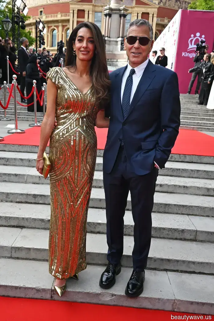 Amal Clooney's stylish dress trend will be seen at every black-tie wedding you go to this summer.
