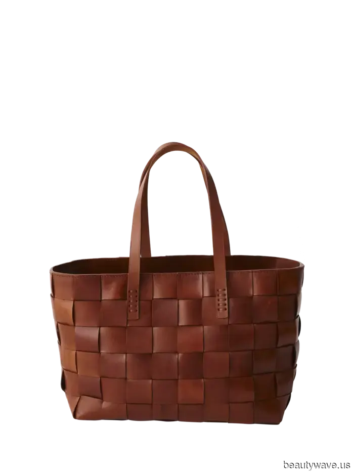 If you’re purchasing a woven bag this summer, opt for this sophisticated, classic design.