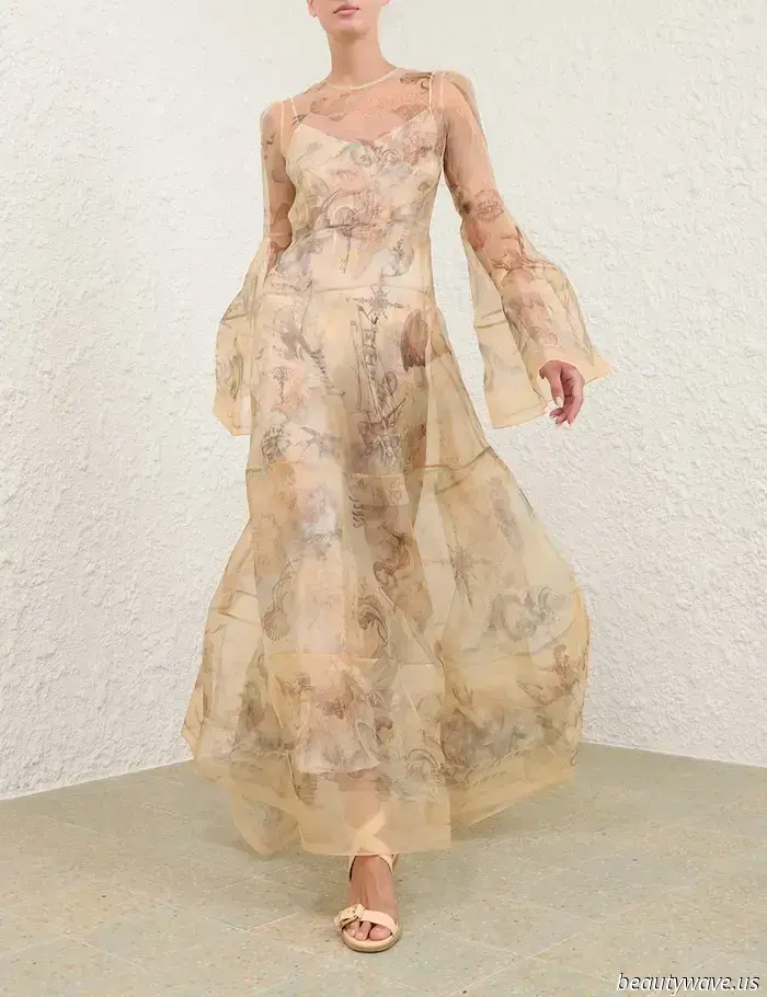 Soft Elegance is in vogue—Dakota Fanning resembles a figure from a Pre-Raphaelite painting in this dress.