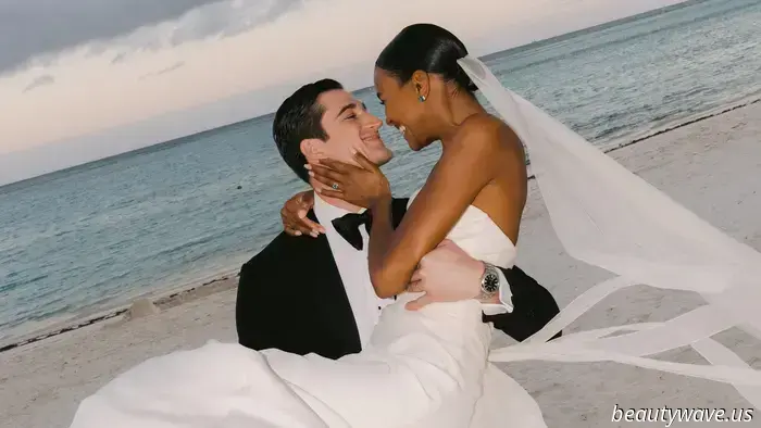 The bride donned a custom-made dress, while the groom opted for Ralph Lauren for their stunning beach wedding in the Caribbean.
