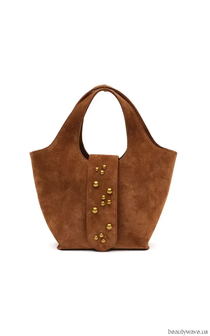 I just returned from Barcelona and Amsterdam—every single woman had this anti-minimalist bag with them.