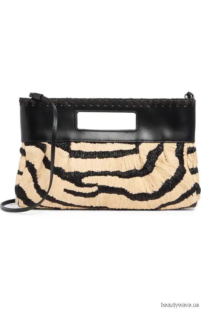 Wenn Sie genug von Leopardenmuster haben, hat Dua Lipa gerade den Taschen-Trend getragen, den Sie stattdessen kaufen sollten.