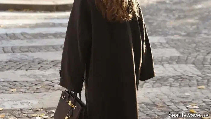 I donned this chic coat in Paris, and noticed other fashionable women sporting it in Saint-Germain-des-Prés…
