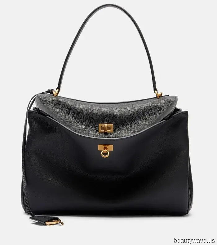 I’m not bidding farewell to color, but every stylish bag I come across seems to follow this trending black design.