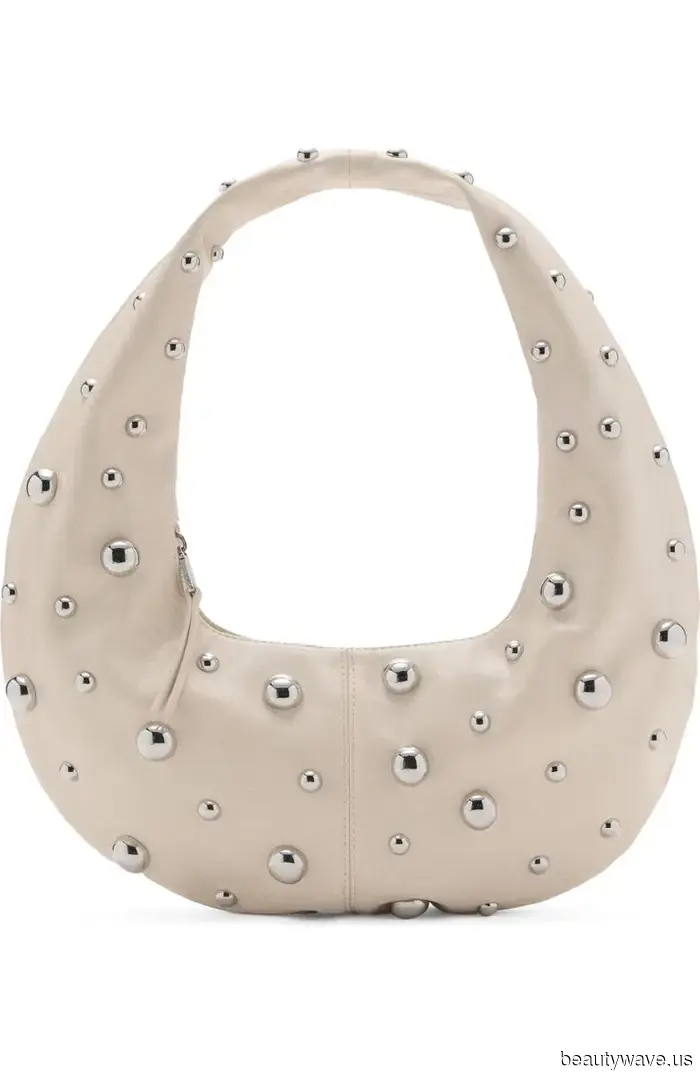 I just returned from Barcelona and Amsterdam—every girl had this non-minimalist bag with her.